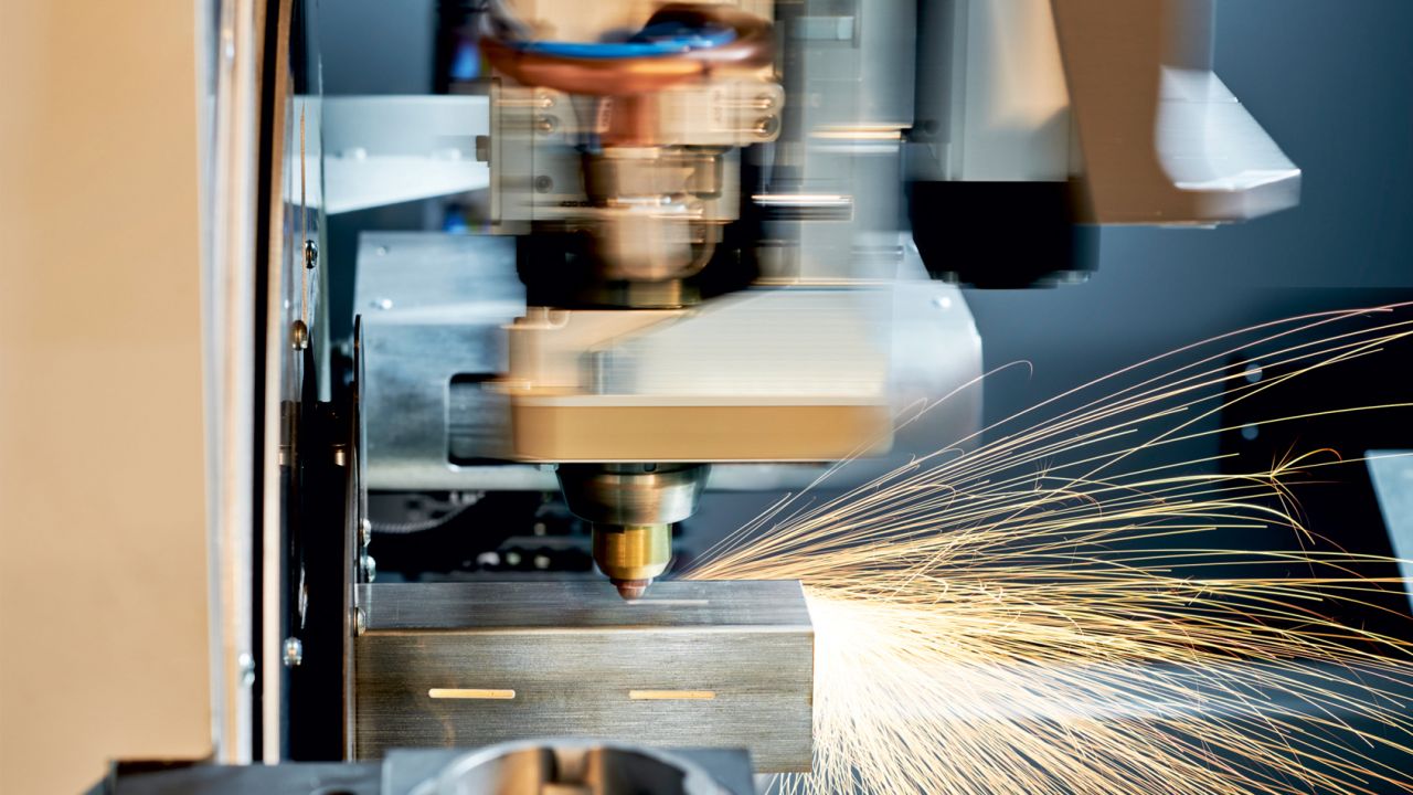 ByTube Star cutting head and a square tube with sparks flying