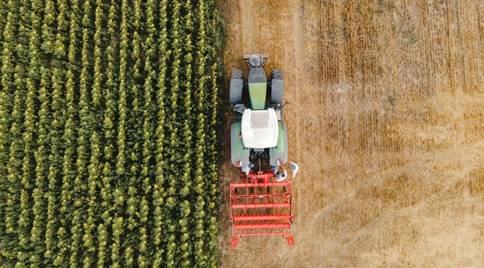 Agricultural machinery industry photo by Teo Sticea on Unsplash, showcasing equipment vital to agriculture and farm machinery