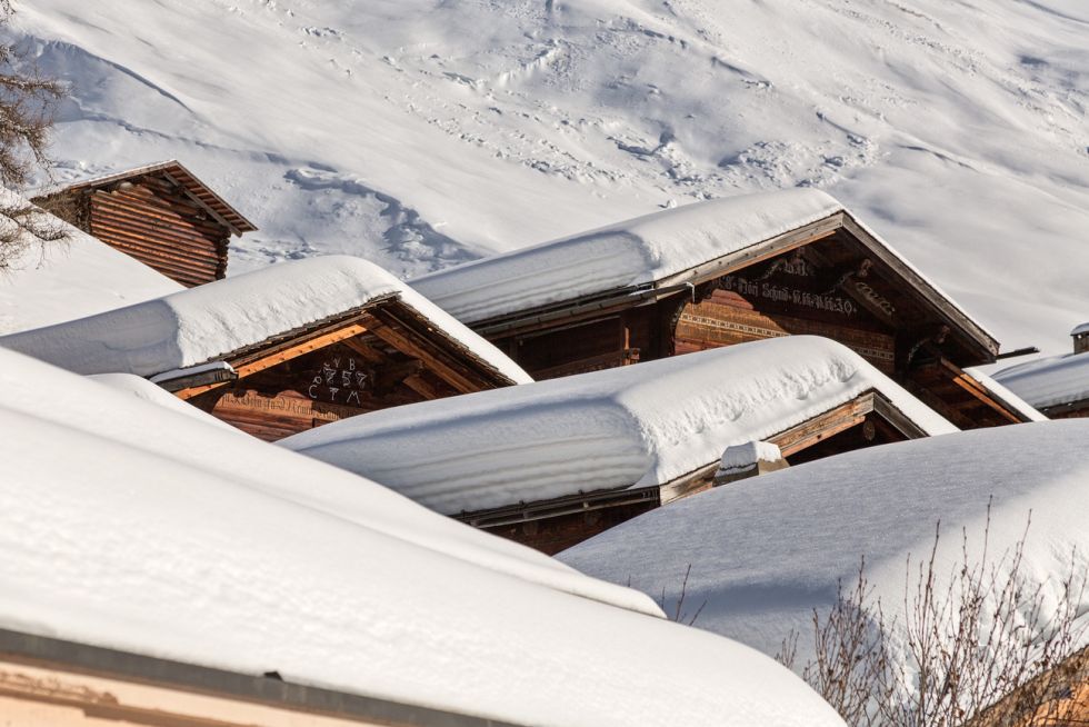 Houses covered in Snow in the Swiss mountains