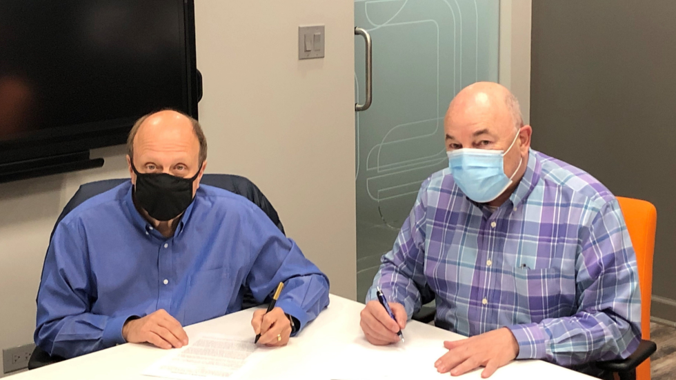 President of Bystronic Inc. and President of CLOOS signing agreement